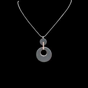Recovered necklace with a pendant featuring two circular elements 20